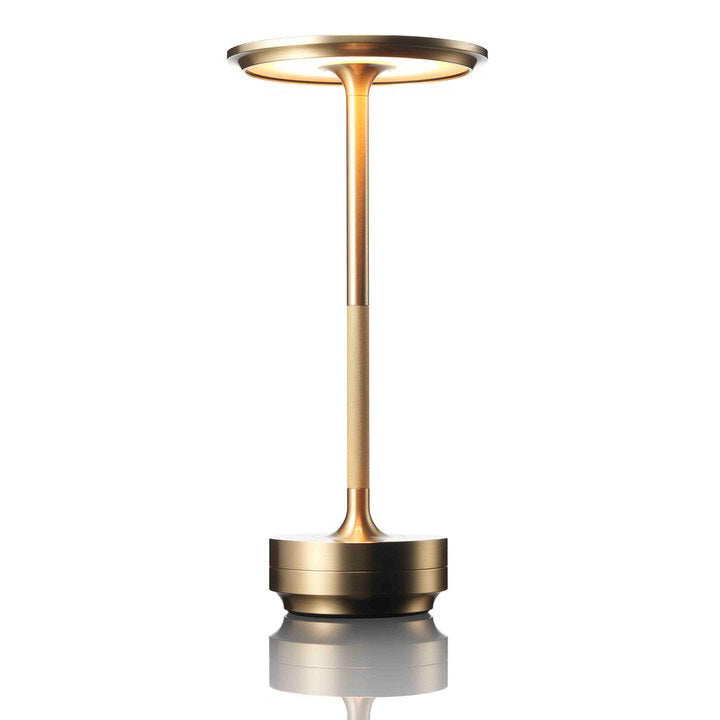 Gold-coloured lamp on a white background