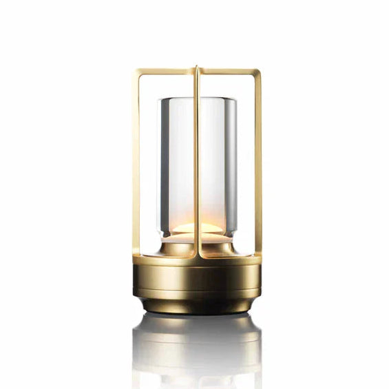 Gold lantern with glass shade on a white background