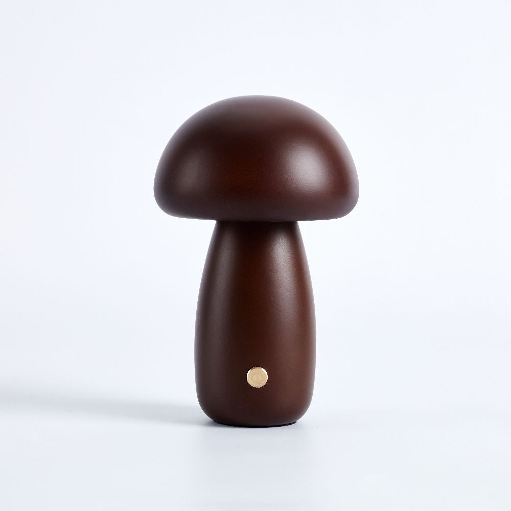 Brown mushroom-shaped lamp on a white background