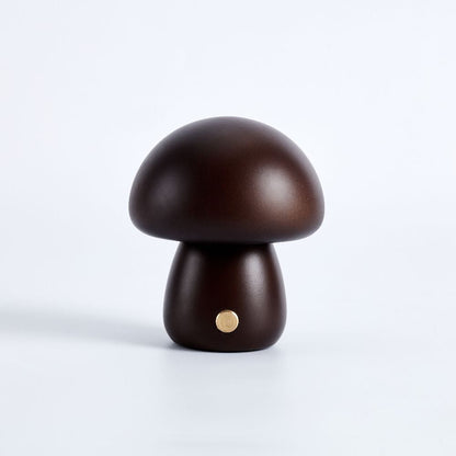 Wooden mushroom-shaped lamp on a white background