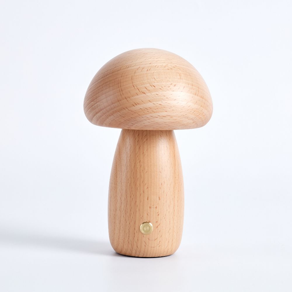 Wooden mushroom-shaped lamp on a white background
