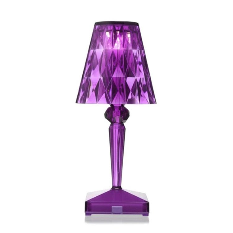 Purple crystal-style lamp on a white background