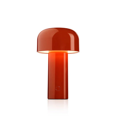 Red table lamp on a white background