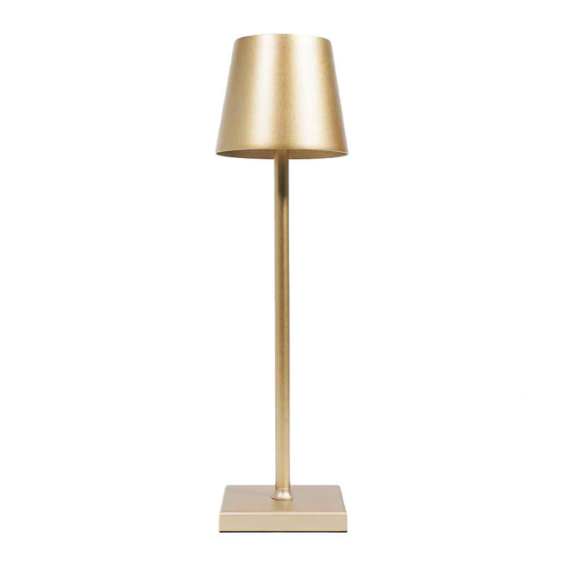 Gold table lamp on a white background
