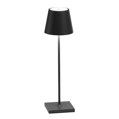 Black table lamp with a square base on a white background