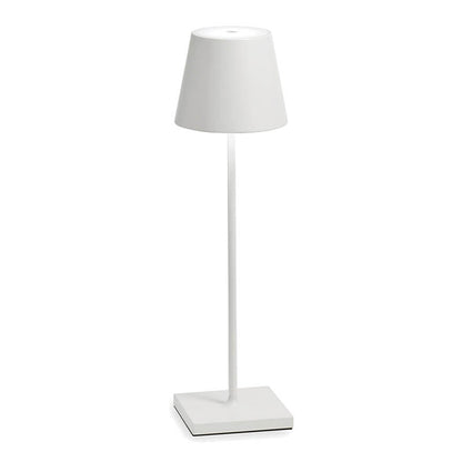 White floor lamp with a square base on a white background